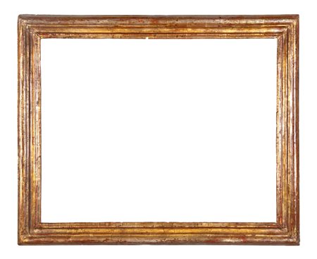 MANIFATTURA ITALIANA DEL XVIII SECOLO In legno dorato a mecca, battuta a gola...