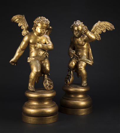MANIFATTURA ITALIANA DEL XVII SECOLO Coppia di putti reggi cero in legno...
