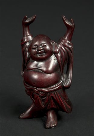 MANIFATTURA DI CACCIAPUOTI (XX SECOLO) Buddha sorridente con le mani alzate....