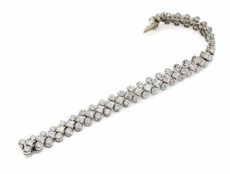 Bracciale in oro bianco con diamanti taglio carré e brillante del peso...