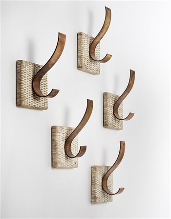 Gio Ponti (Milano 1891 - Milano 1979)Cinque rari porta mantelli. Esecuzione...