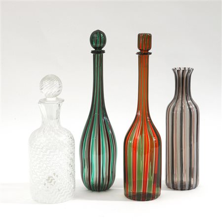 Manifattura di Murano Gruppo di quattro bottiglie in vetro soffiato a canne...