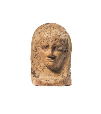 TESTA VOTIVA DATAZIONE: III sec. a. C. MATERIA E TECNICA: impasto ricco di...