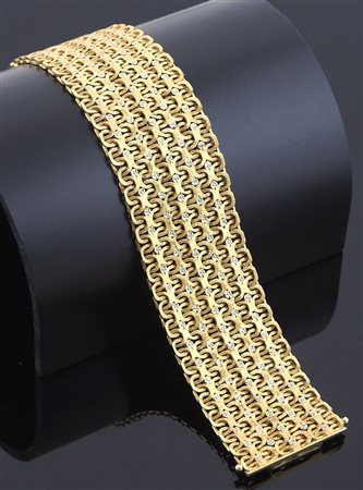 Bracciale a fascia in oro giallo con inserti di piccoli diamanti, gr 85,2