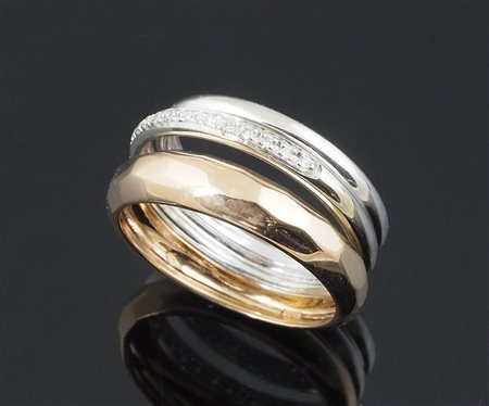 Anello a fascia in oro bianco e rosa, fascia centrale con diamantini taglio...