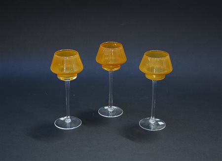 Tre calici porta candele in vetro con coppa color ambra (h cm 20)