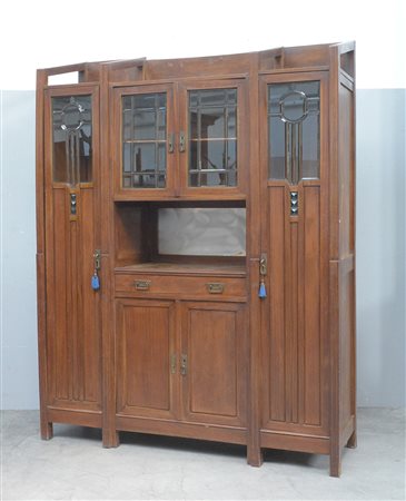 Credenza liberty con due ante laterali, parte centrale con vano a giorno e...