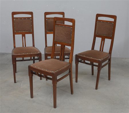 Gruppo di quattro sedie liberty in mogano massello con intarsi in ottone....