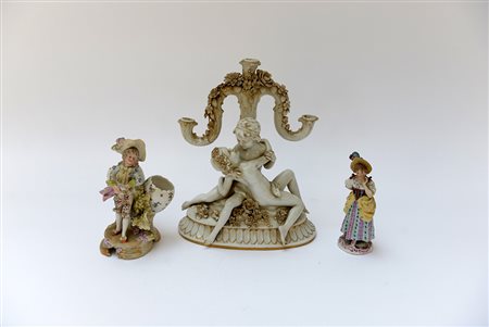 Lotto composto da due sculturine e un candeliere (misure diverse, difetti)