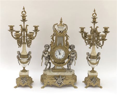 Trittico composto dauna coppia di candelabri a sette fiamme in marmo e...