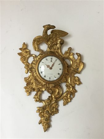 Piccolo orologio da muro in bronzo, moviemnto con carica a chiavetta,...