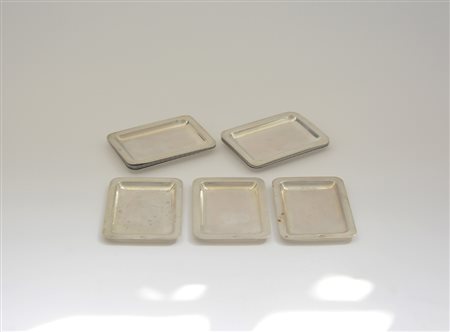 Gruppo di dodici posaceneri di forma rettangolare in argento (gr. 160)