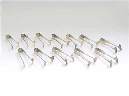 Gruppo di dodici posate da asparago in argento. Argentiere Faccioli (gr. 615)