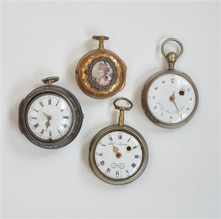 Lotto composto da quattro orologi da tasca in argento e metallo di diverse...