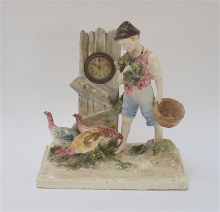 Gruppo in ceramica policroma raffigurante un ragazzo con tacchini davanti a...