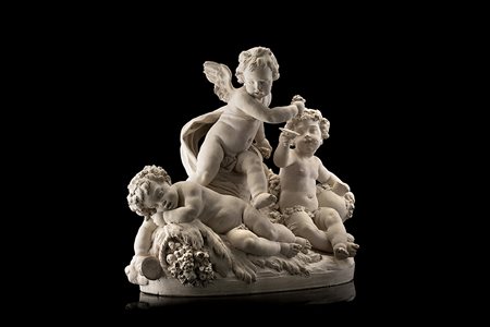 Gruppo scultoreo raffigurante putti baccanti con ghirlande floreali, vaso e...