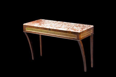 Consolle lastronata in mogano con fasce traforate in legno chiaro a motivo...