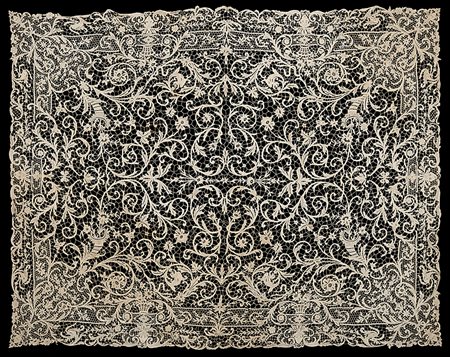 Tovaglia in pizzo, secolo XX. Copritavolo rettangolare in pizzo punto Venezia...