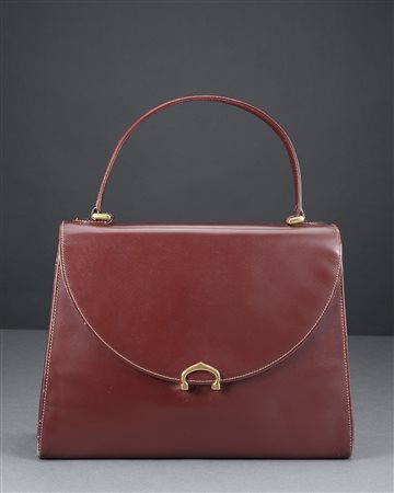 CARTIER Borsa a mano in pelle bordeaux con chiusura logata e dettagli color...