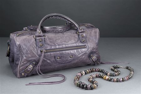 BALENCIAGA e anonimoLotto composto da borsa in cuoio effetto invecchiato...