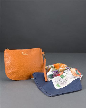 POMELLATO e GUCCIPiccola trousse portagioliello da viaggio in pelle arancione...