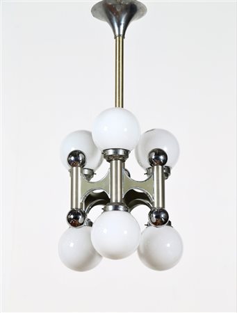 SCIOLARI GAETANO Lampadario sei luci in metallo cromato, anni 70. -. Cm 35,00...