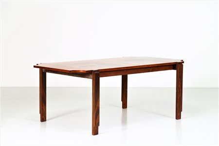 MANGIAROTTI ANGELO (n. 1921) Attrib. Tavolo in palissandro,anni 60. -. Cm...