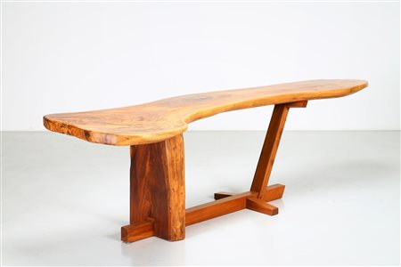 NAKASHIMA GEORGE Alla maniera di. Tavolo in noce americano, anni 60. -. Cm...