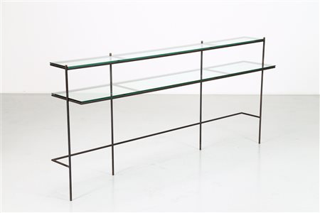 ANONIMO Consolle in tondino di ferro dettagli in ottone e piani in cristallo....