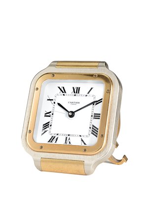 CARTIEROrologio da viaggio in metallo bianco e doratoAnni '80Quadrante,...