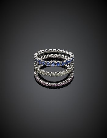 *DI GREGORIOLotto di tre fedine eternity in oro bianco con zaffiri, corindoni...