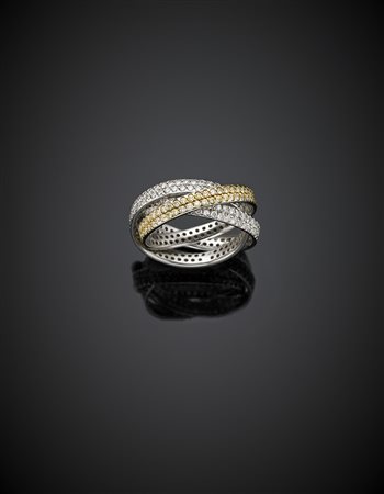 *DI GREGORIO Anello in oro bianco e giallo a tre fasce intrecciate con due...