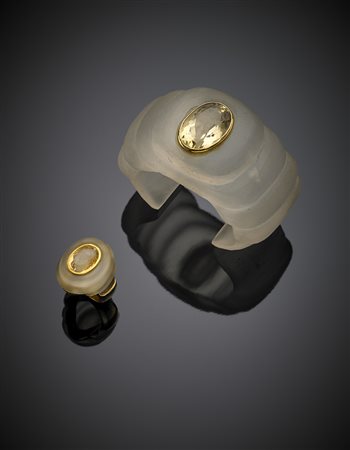 Demi-parure composta da anello e bracciale in oro giallo con quarzo ialino...