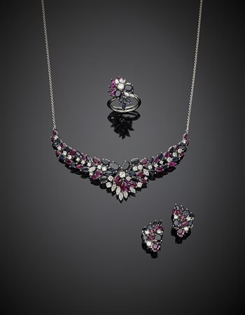 Demi parure in oro bianco con diamanti zaffiri e rubini composta da collana...