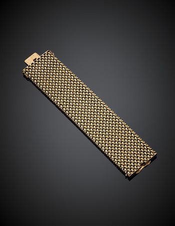 Bracciale a fascia intrecciata a grana di riso in oro bianco e giallo, g...