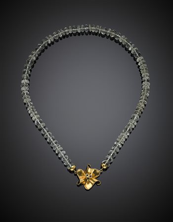 DE REGIBUSCollier a boules briolé di aquamarine con chiusura a fiore in oro...