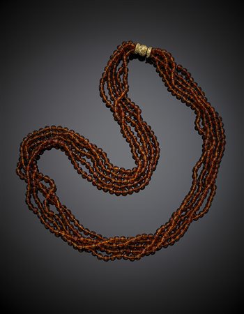 Collana a cinque fili di boules sfaccettate di materiale plastico color...