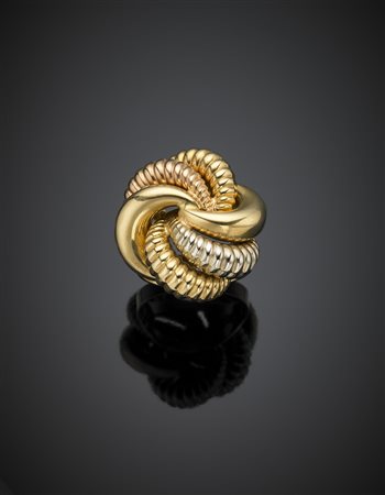 Anello in oro giallo, bianco e rosa a guisa di nodo, g 14,54 misura...