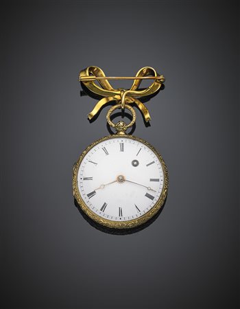 Orologio a spilla in oro giallo e smalti g 38,03, diam. cm 3,5.-ENYellow...