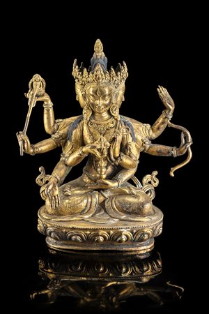Scultura in bronzo dorato raffigurante la divinità Ushnishavijiaya seduta su...