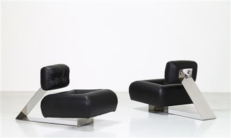 NIEMEYER OSCAR Coppia di poltrone Aran. -. Cm 75,00 x 70,00 x 135,00. Acciaio...
