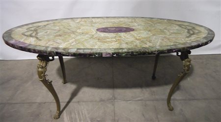 Tavolo da salotto di forma ovale, piano lastronato in pietre dure , gambe in...