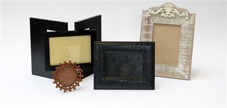 Lotto di quattro cornici portafoto diverse