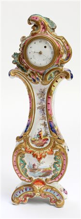 Orologio da tavolo in ceramica policroma, movimento con carica giornalliera...