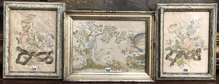 Lotto composto da tre ricami su seta raffiguranti motivi floreali e volatili....