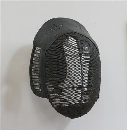 Antica maschera da scherma in rete metallica e cuoio.Ultimo quarto secolo XIX...