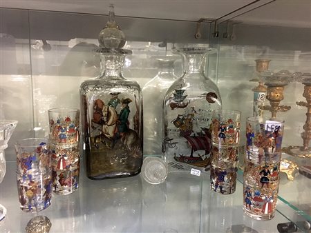 Manifattura del sec. XIX. Lotto composto da due bottiglie con tappi e undici...