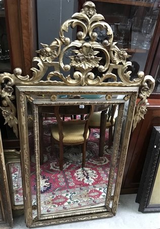 Specchiera con cornice a doppio ordine in legno intagliato e dorato (cm...