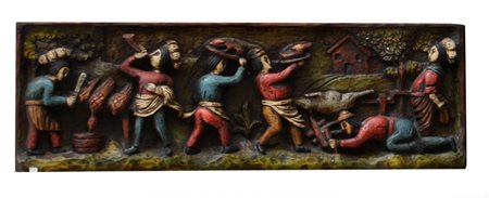 Pannello decorativo in legno intagliato ad altorilievo e dipinto raffigurante...