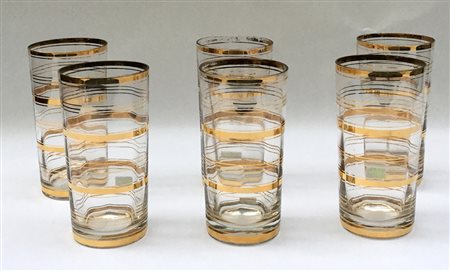 Gruppo di sei bicchieri in vetro decorato in oro. Italia, secolo XX. (lievi...